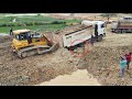 Idiot truck driver almost fail recovery by shantui bulldozer and working processing the road