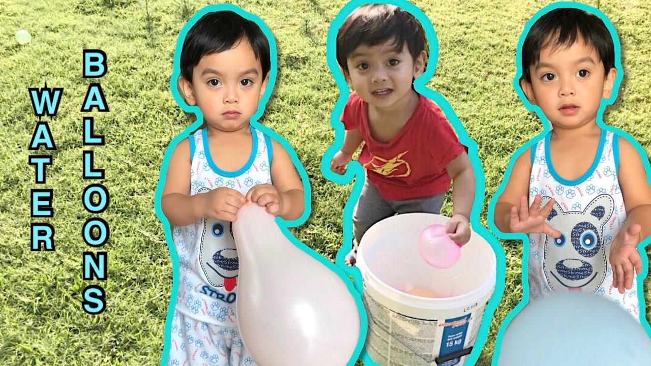 Little Julian plays with water balloons Nursery rhymes YouTube