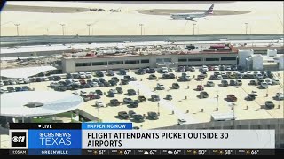 Flight attendants picket outside airports worldwide