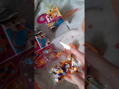 Распаковка Брелок LEGO DOTS Леопард 84 детали (41929) из Rozetka Распаковка Брелок LEGO DOTS Леопард 84 детали (41929) из Rozetka
