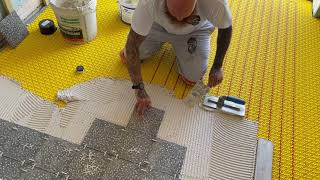 Dural durabase c1ufh anti fracture matting and Devi loose wire system.installation time lapse.