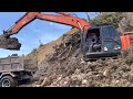 Excavator dig and load soil into big dump truck