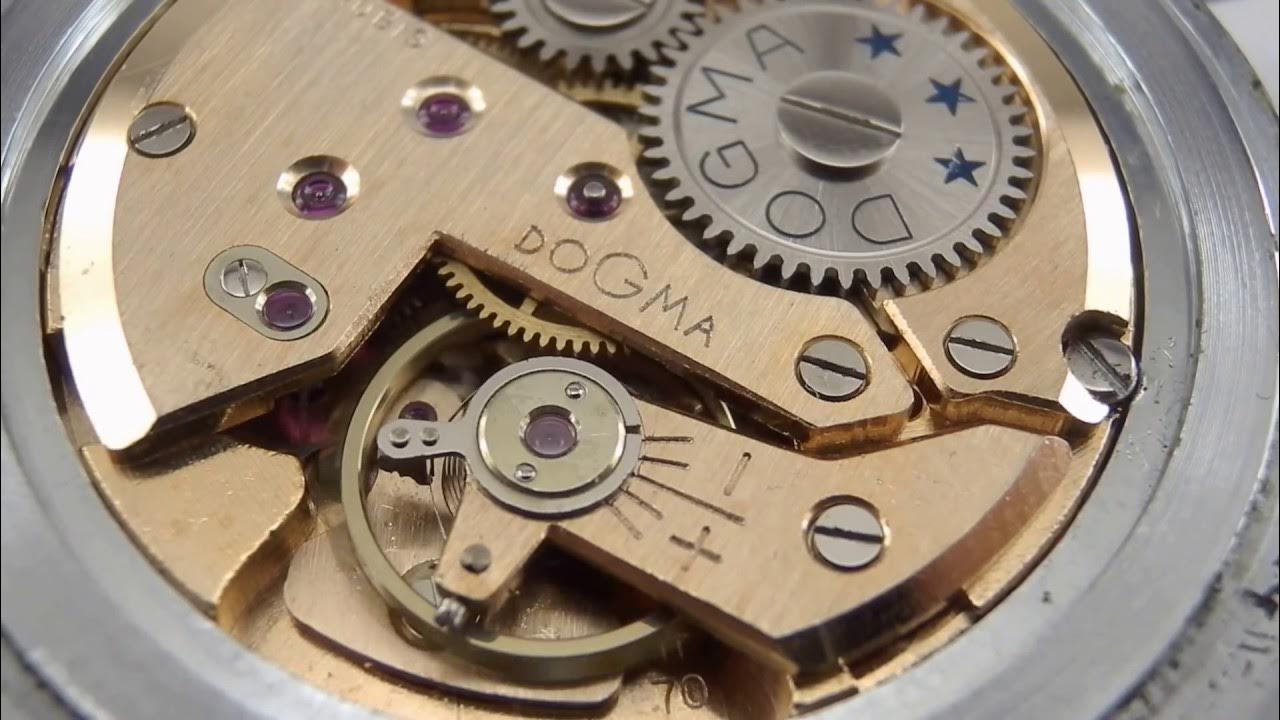 Dogma manual wind watch movement by FHF cal.702 running,รับซ่อม นาฬิกา