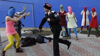 Pussy Riot attacked with whips by police at Sochi(Russian punk group Pussy Riot is attacked by Cossack militia as they try to perform under a sign for the Sochi Olympics. Cossack militia attacked the Pussy Riot ..., 2014-02-19T14:43:57.000Z)