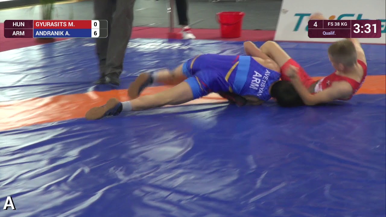 Qual. FS - 38 kg: M. GYURASITS (HUN) v. A. ANDRANIK (ARM)