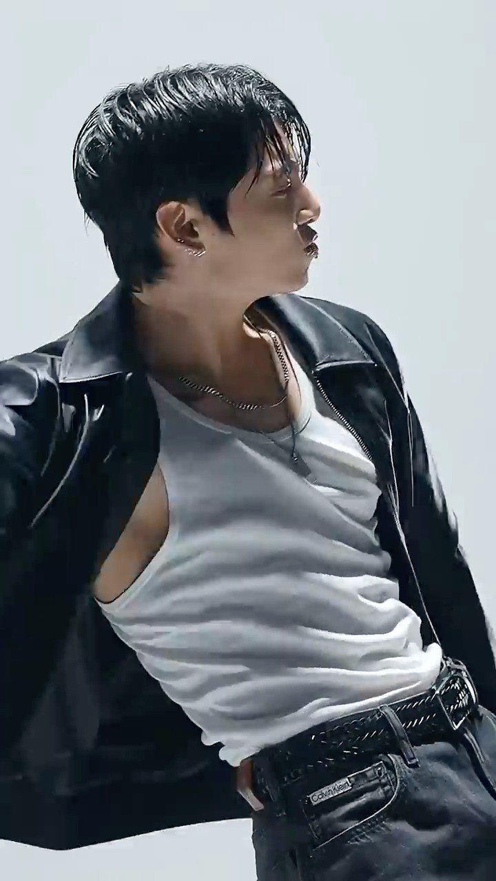 Jung Kook on set in the 90s denim signatures. Made to dance, style
