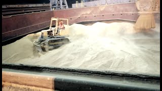 Loading distilled dried grains with solubles - trimming