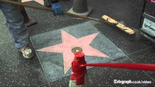 Bill Cosby's Walk of Fame star vandalised with word 'rapist'