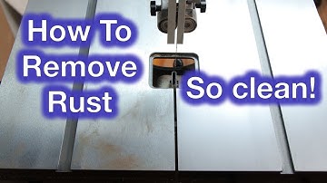 How to remove surface rust from the cast iron table of a band saw?