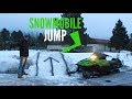 BUILDING A HUGE SNOWMOBILE JUMP!!