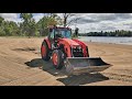 Kubota M32 Tractor Raking The Beach Sand