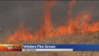 More than 500 firefighters and personnel are trying to get a perimeter
around the fast-moving fire, but containment thus far is minimal.