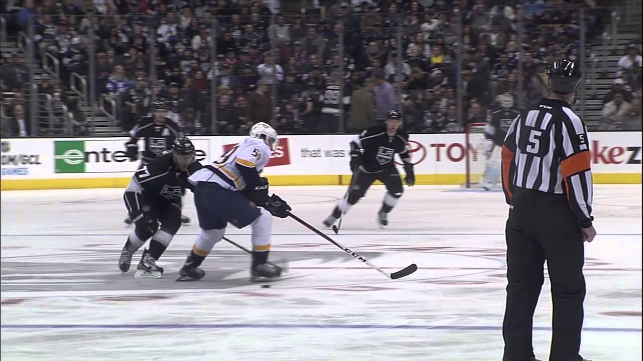 Justin Schultz Washington Capitals Unsigned White Jersey Skating vs. Pittsburgh Penguins Photograph