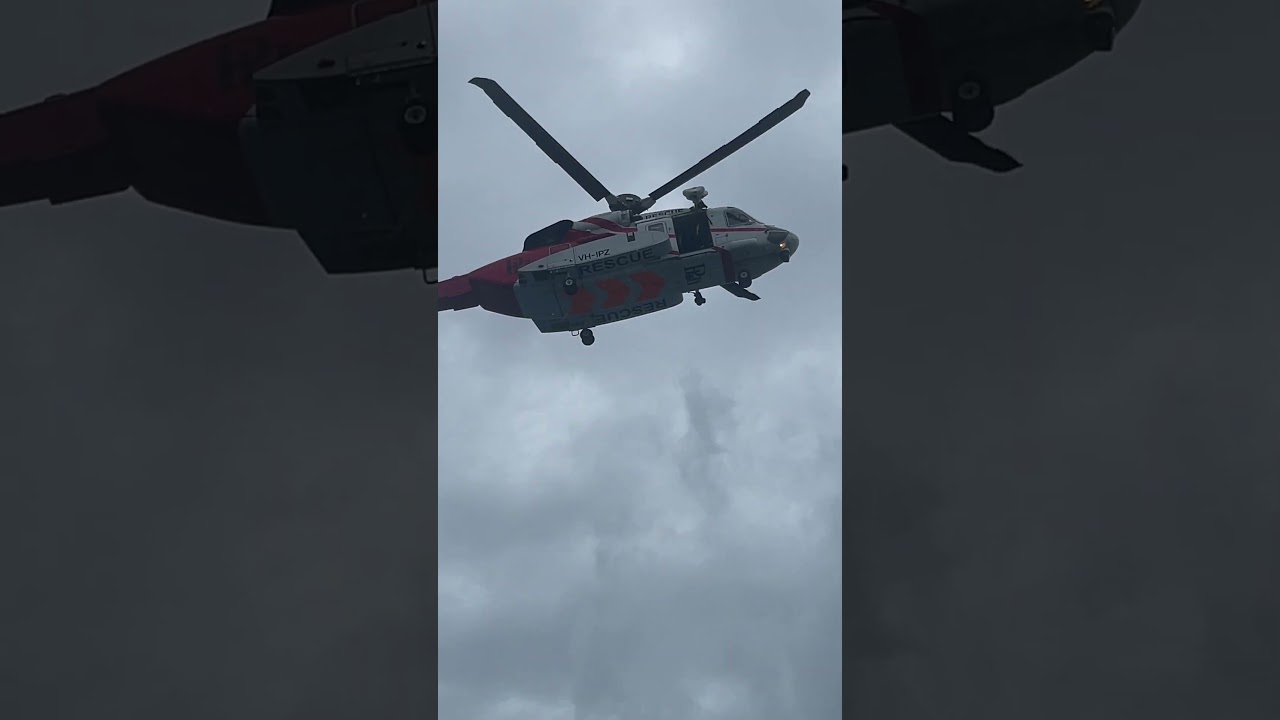 Australian rescue Helicopter runs practice maneuvers on Stern of MS Zaandam