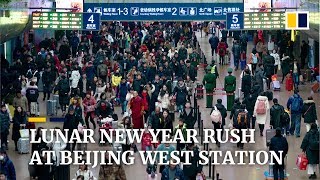 Lunar New Year rush at Beijing train station as world’s ‘largest migration’ gets underway