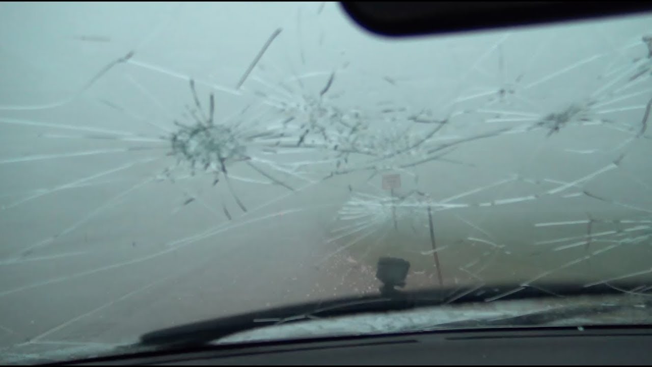 INCREDIBLE hail core pummels Nissan Sentra, blowing out back window