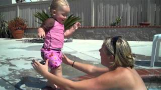 Girl in tight swim suit jumping in pool 5 2011