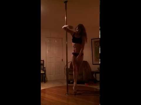 Invictus Split pole dance trick on spin pole