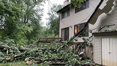 Storms leave thousands without power, trees fallen onto homes and cars engulfed in flames