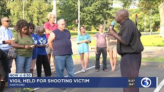 VIDEO: Vigil held for man shot and killed in officer involved shooting