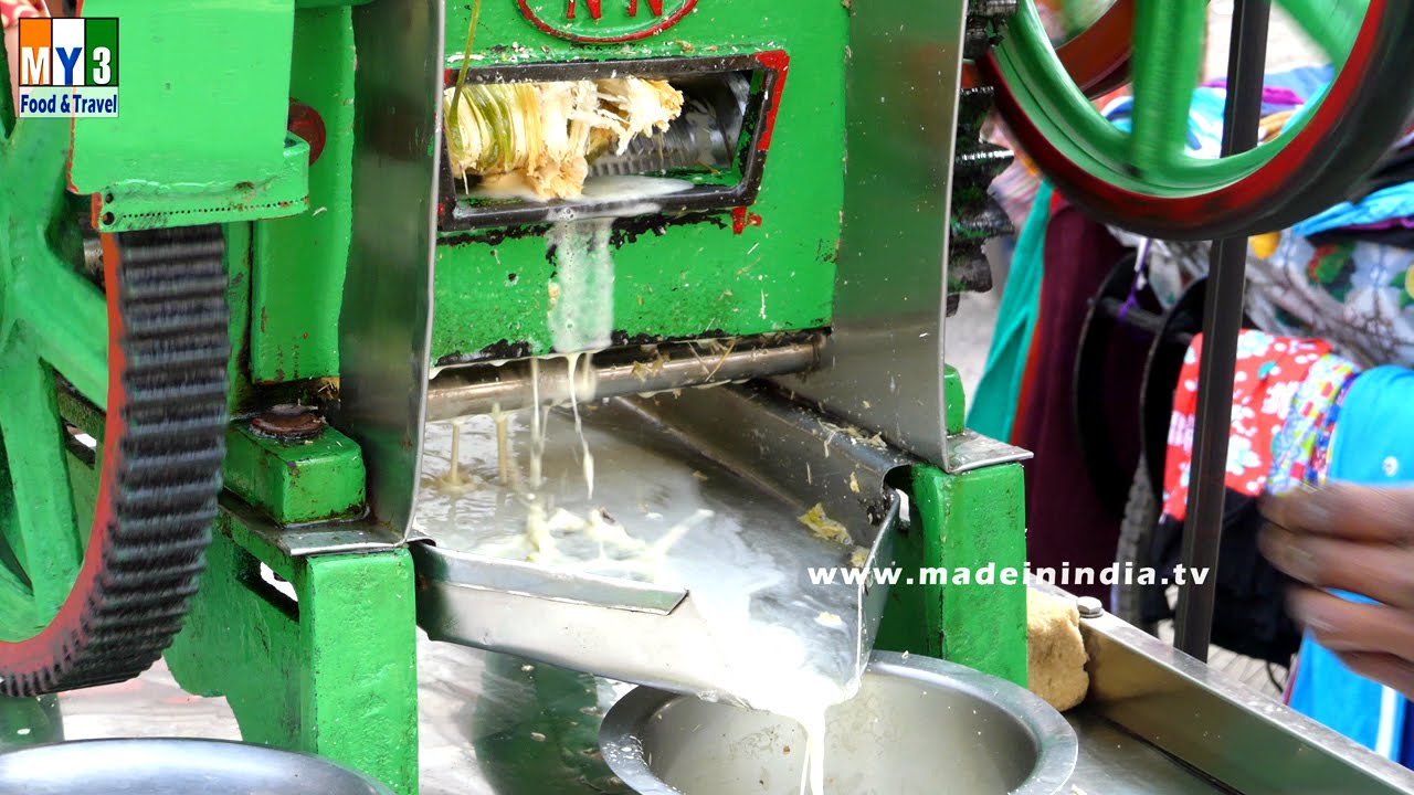 SUGARCANE JUICE | Ganne Ka Ras | Sugarcane juice extracting street food | STREET FOOD