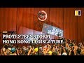 Small Group of Hong Kong Protesters Trash Legislative Building Amid Peaceful March