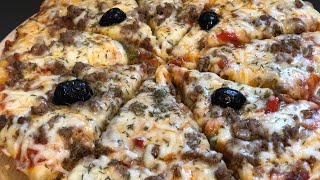 بيتزا السائلة بدون مجهود وكتوجد بسرعة غير فالمقلة .  pizza saila rapide vite fait bien fait