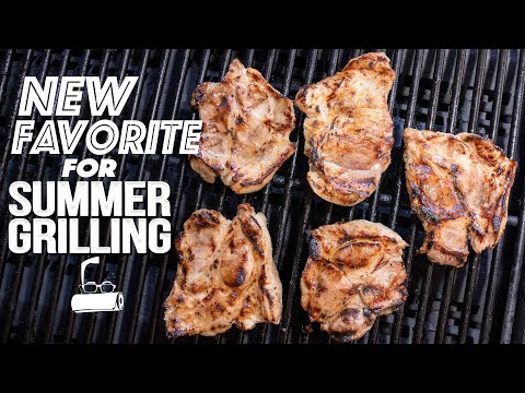 Grilled coconut-lime marinated pork shoulder steaks on a Thai-style salad, from the video