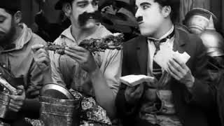 Charlie Chaplin Funny Eating In Movie Behind The Screen Is A 1916 American Silent Short Comedy