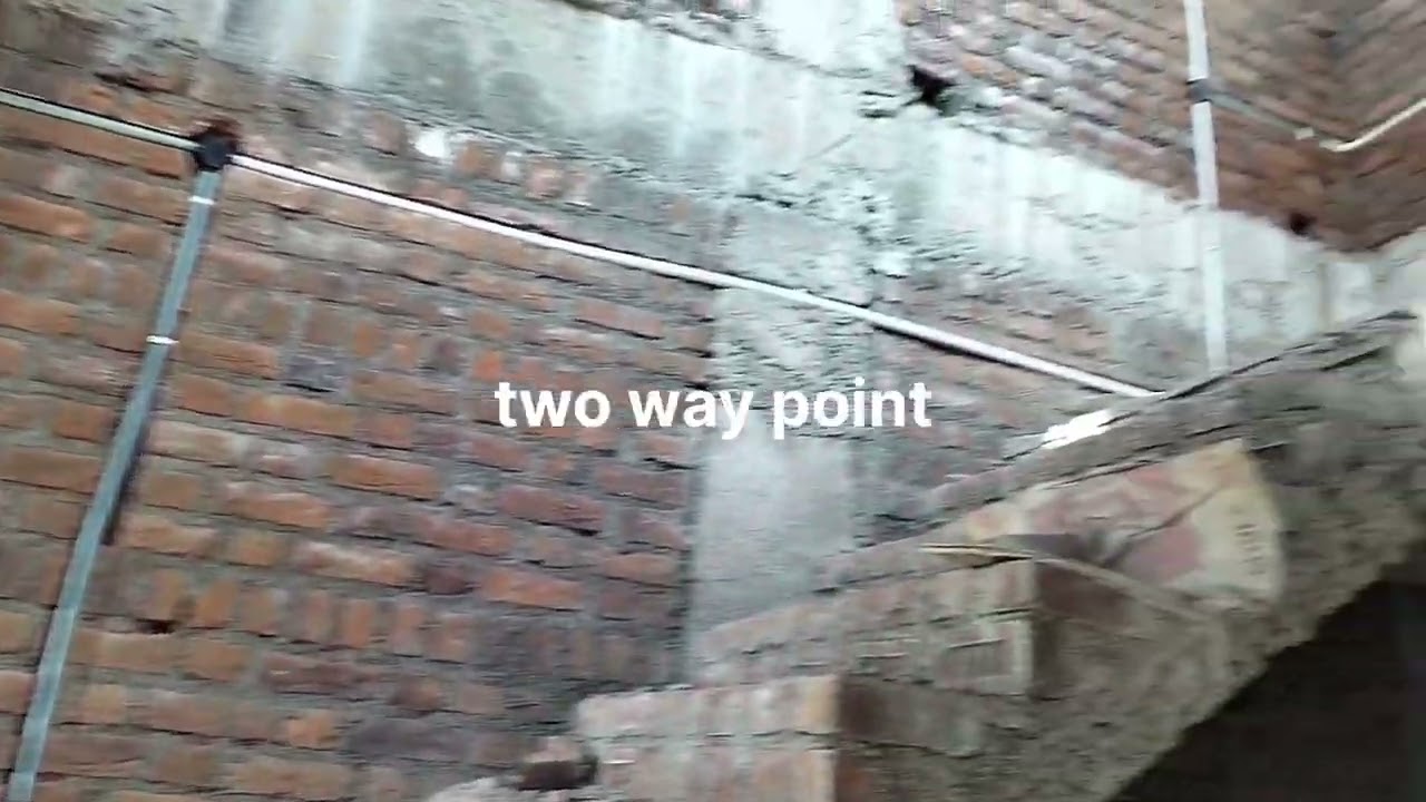 Wall cutting pipe fitting electrician work in plumbing work