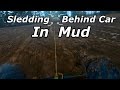 Towing Car Hood Sled Behind Car in Mud