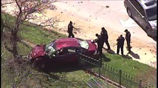 Man killed, teen injured after officer-involved shooting, car crash in Cleveland