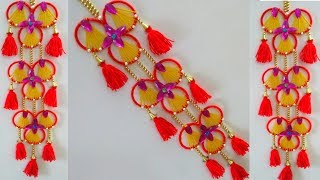 NEW DESIGN BANGLES WALL HANGGINNG CRAFTS//BEST OUT OF WASTE WOOLEN DOOR TORAN//WALL DECOR 2019