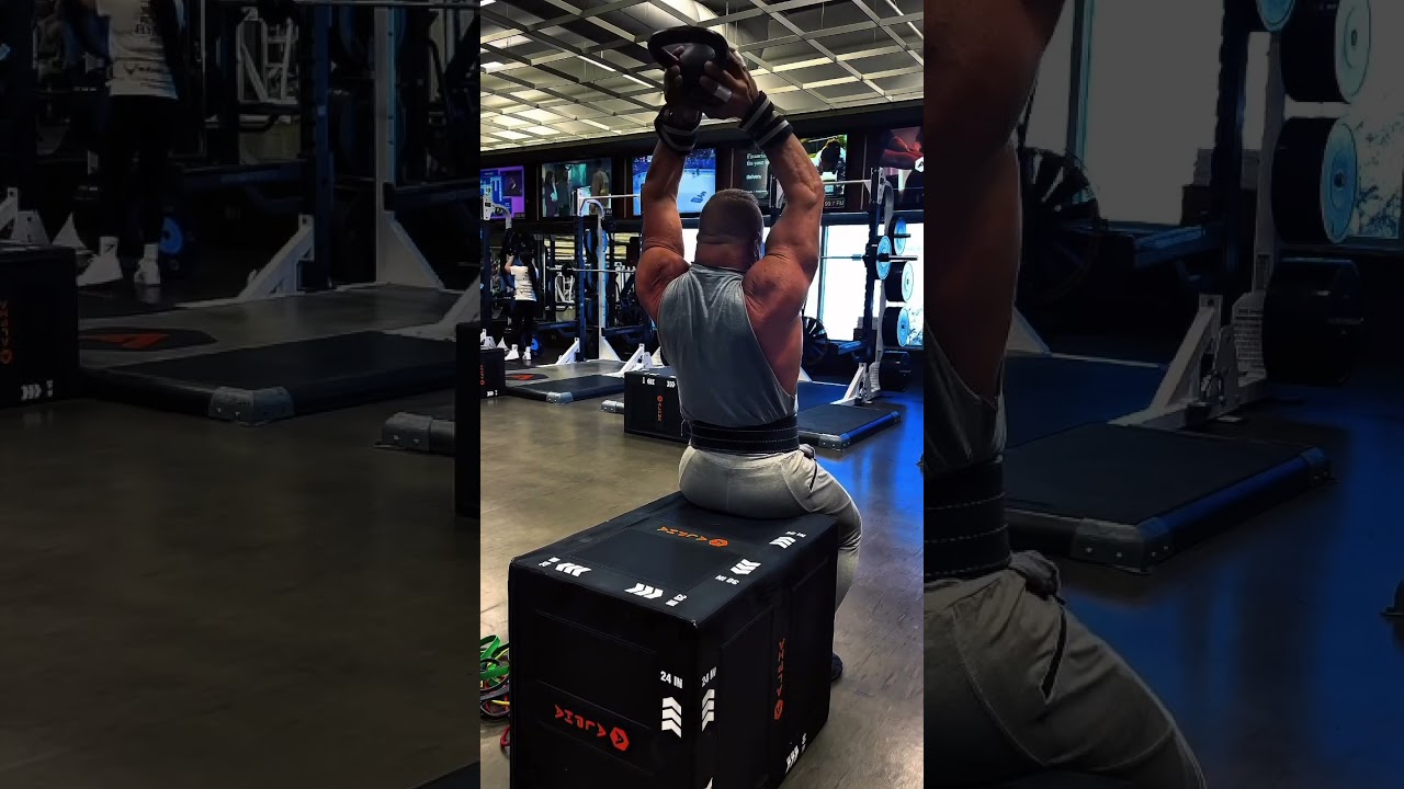 Seated overhead tricep extensions, using a kettlebell at the end of your tricep workout
