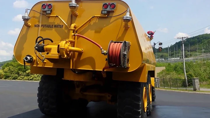 New Caterpillar 745C with New 9,000 gallon water tank by HEC - walk around