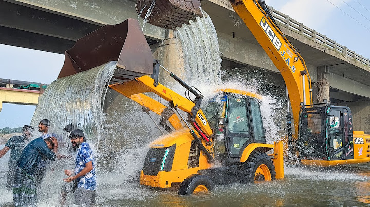 Washing JCB 215 Excavator and JCB 3DX with Driver take Blissful bath together in Thamirabarani River