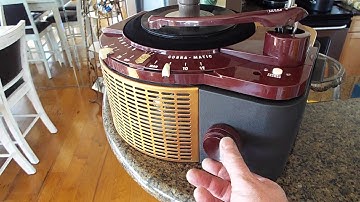 Zenith Cobra-Matic record player playing some records