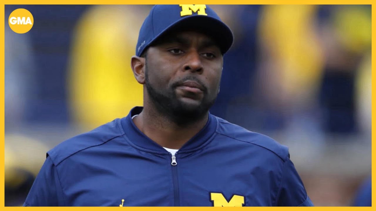 Former Michigan coach charged with home invasion, stalking