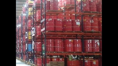 Overhead Stacker Crane Stores Retrieves Drums Over Selective Racks Across Multiple Aisles