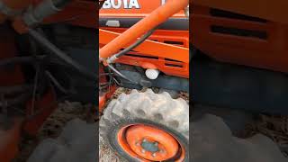 Kubota L2530 tractor, 5 ft bush hog, rear blade/scraper.