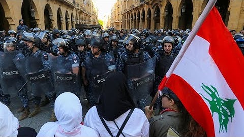 ‘It’s your right to arrest us’: Beirut protesters vow to keep up the pressure