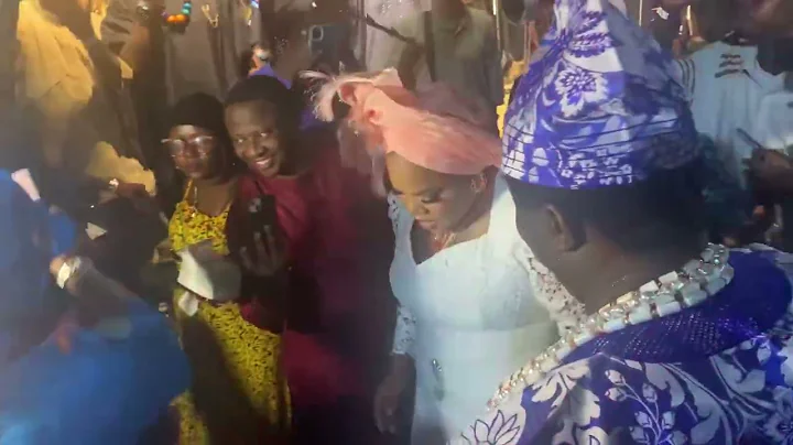 Toyin Aihmaku and Muyiwa Ademola on the dance floor at the premiere of Warlord by odunlade Adekola 