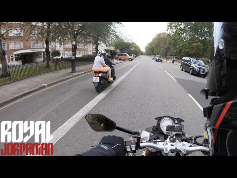 BMW S1000Rs almost beaten by a scooter in a drag race