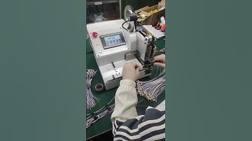 HH-345F Tape Spot Wrapping Machine is wrapping tapes on receptacle cable assembly for customer