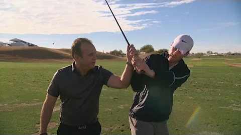 Seattle Seahawk Bryan Walters gets a lesson from i...