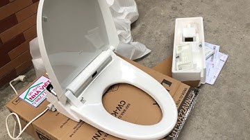 Trên tay nắp bàn cầu phun rửa tự động INAX CW-KA22AVN bảng điều khiển rời