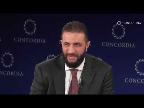 الرئيس أحمد الشرع في ندوة تجمعه مع القائد السابق للاستخبارات الأمريكية  في قم ة كونكورديا
