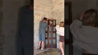 My grandpa's old mailroom door is now our wedding seating chart. What do you think of this flip?