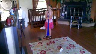 Angelita Playing a Vuvuzela