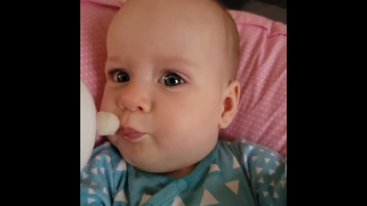 Guinevere learned to blow raspberries and that's all she wants to do